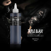 Stigma Triple Black Tattoo Ink 240ml bottle, favored by tattoo artists, with a tattooed arm in the background